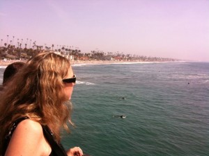 girl looking out to sea in oceanside